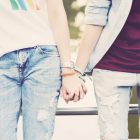 Couple holding hands