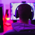 wearing headset and playing computer video games online