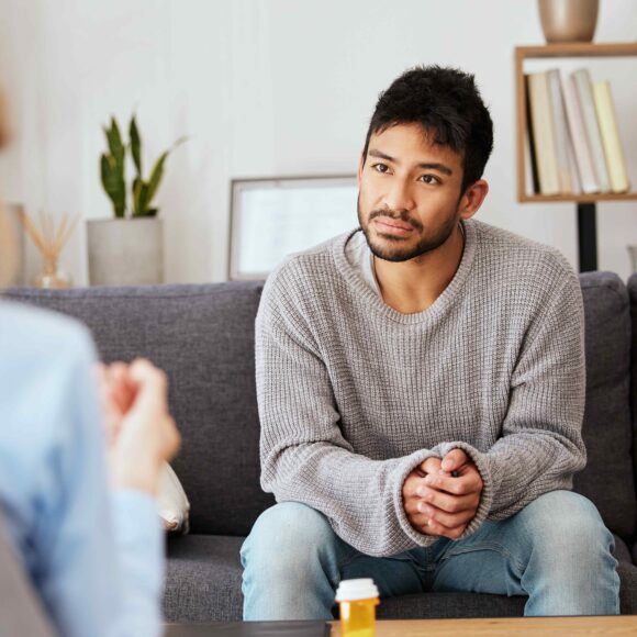 Adult man looking at woman talking